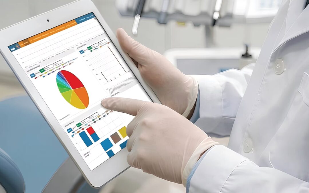 UK dentist reviewing cloud-based dental practice software on tablet