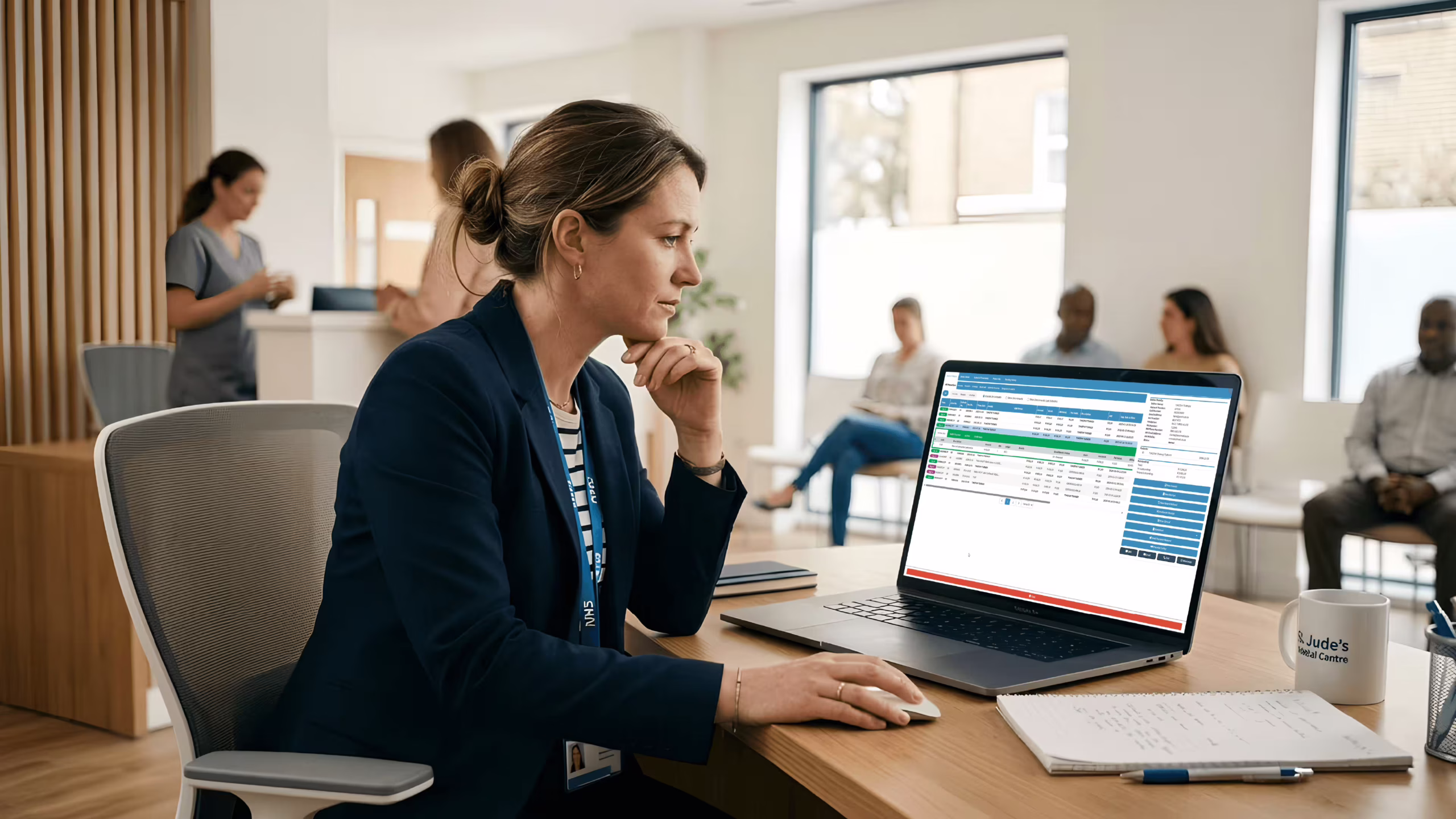 UK clinic manager using software for clinic management to review scheduling and billing dashboard